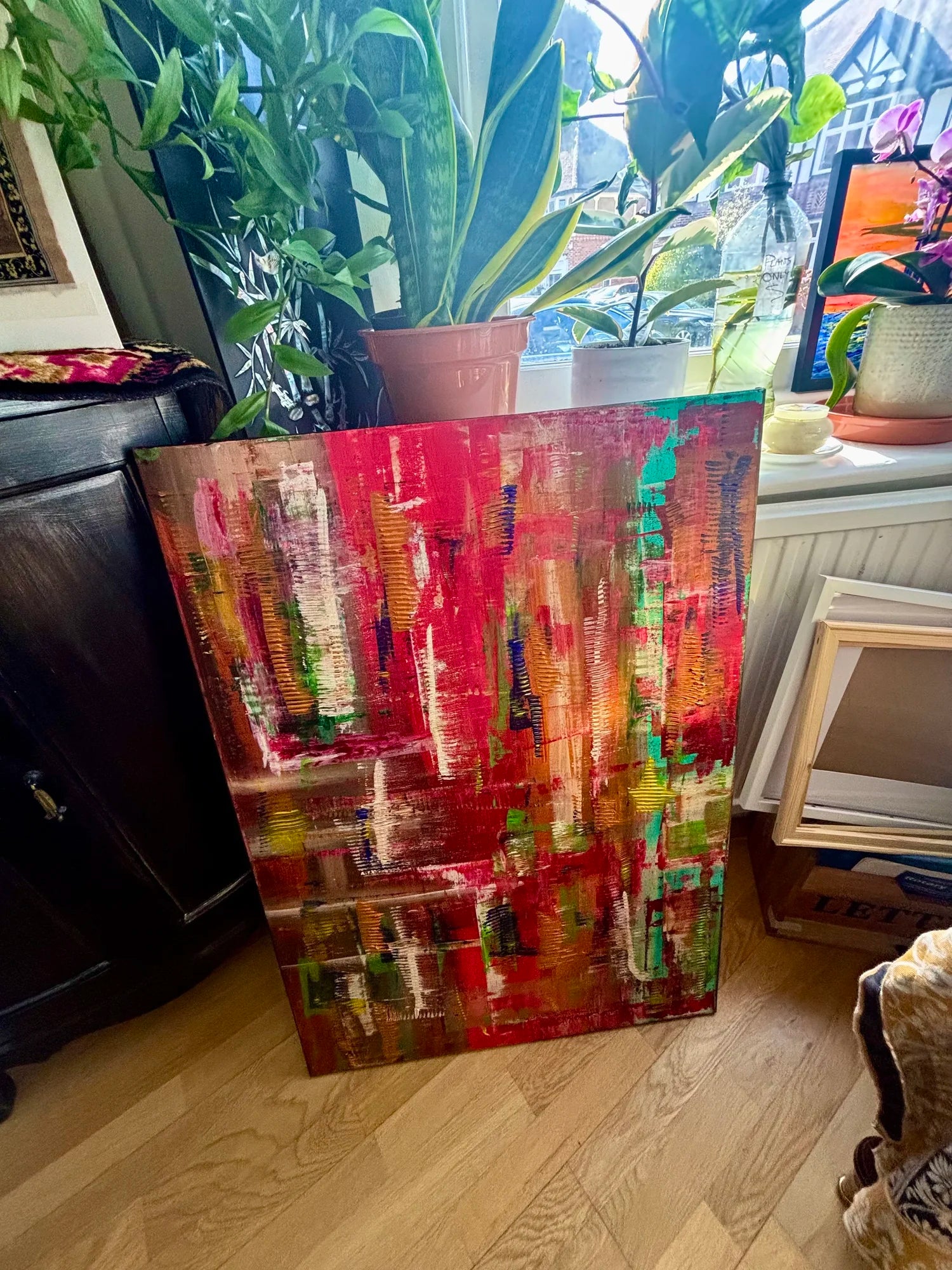 Large red and teal abstract impasto painting on box canvas